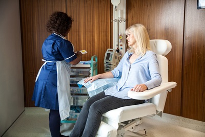 Female Patient seeing nurse specialist HCA UK
