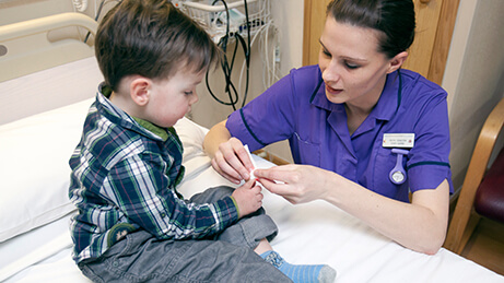 Nurse with child patient